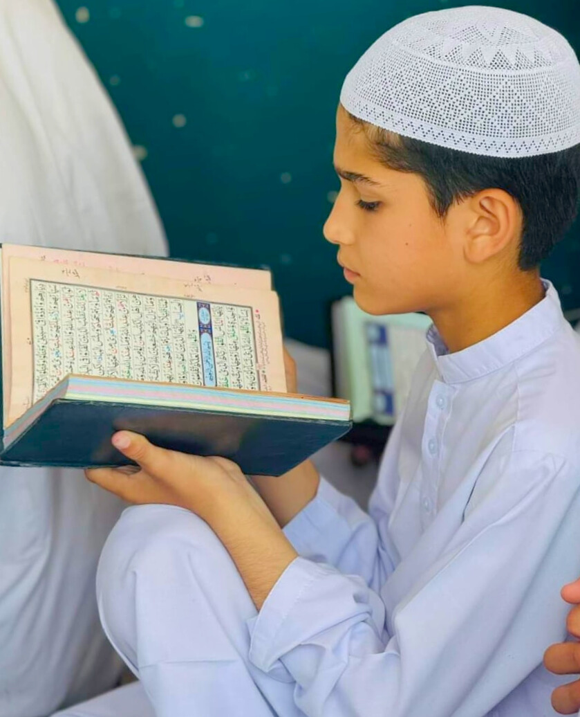 Young student learning Quran online
